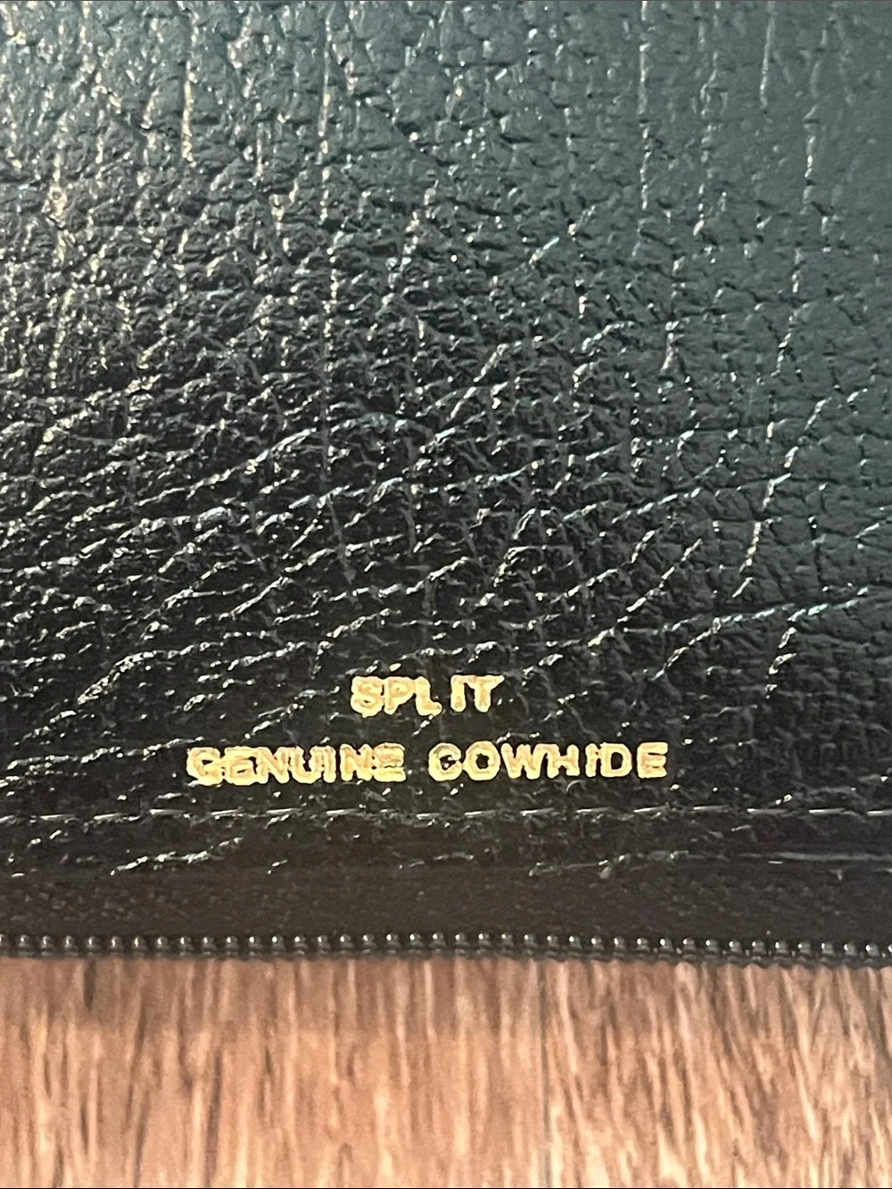 split Black Leather Zip-Around Wallet with Gold Accents